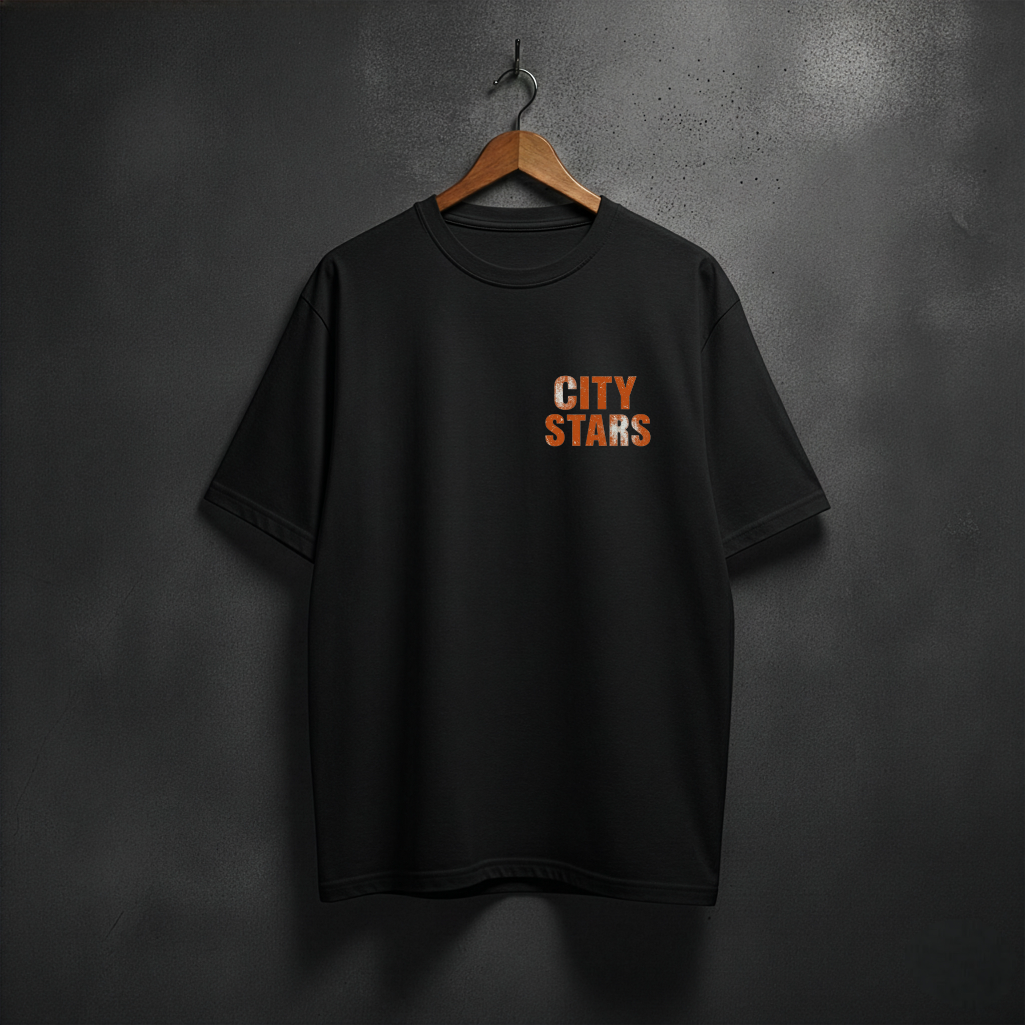 Black t-shirt with 'CITY STARS' text on the front left chest