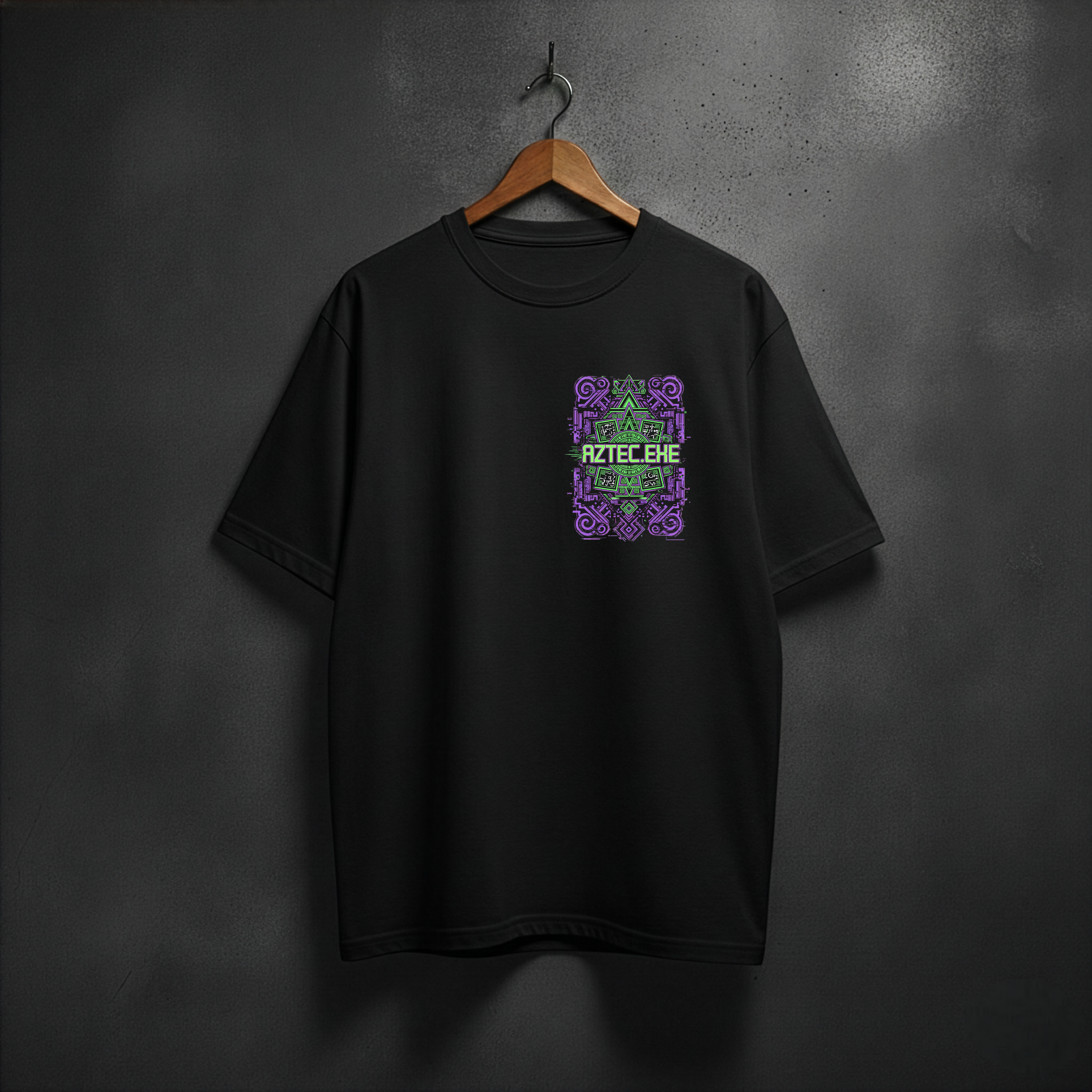 Black t-shirt with a colorful aztec.exe design on the front left chest