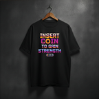 Black T-shirt with arcade style text INSERT COIN TO GAIN STRENGHT on the fron 