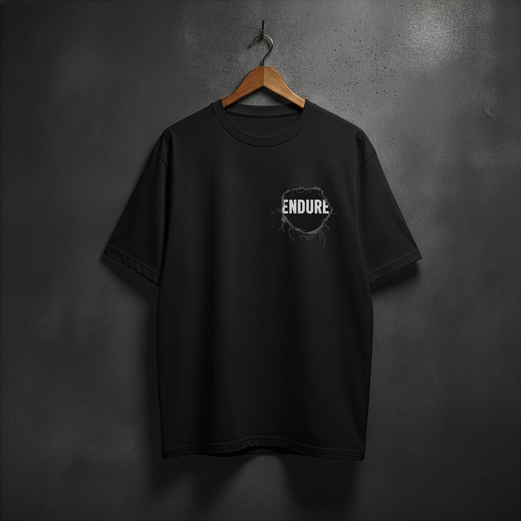 Black t-shirt with 'ENDURE' patch on the left side chest