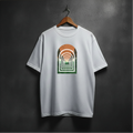 White t-shirt with a graphic of forest arch design on the front 