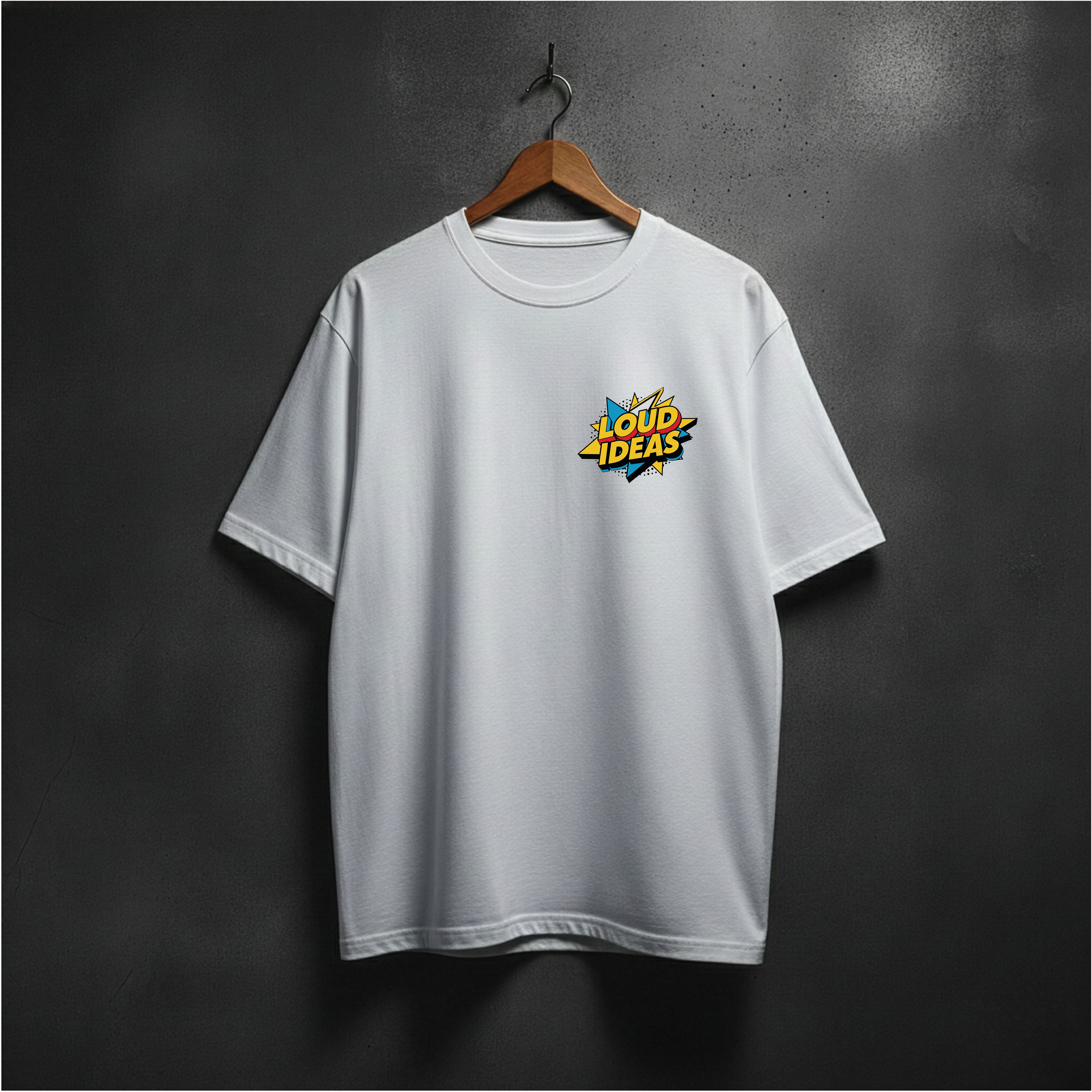 White t-shirt with loud ideas colorful logo on the front left chest