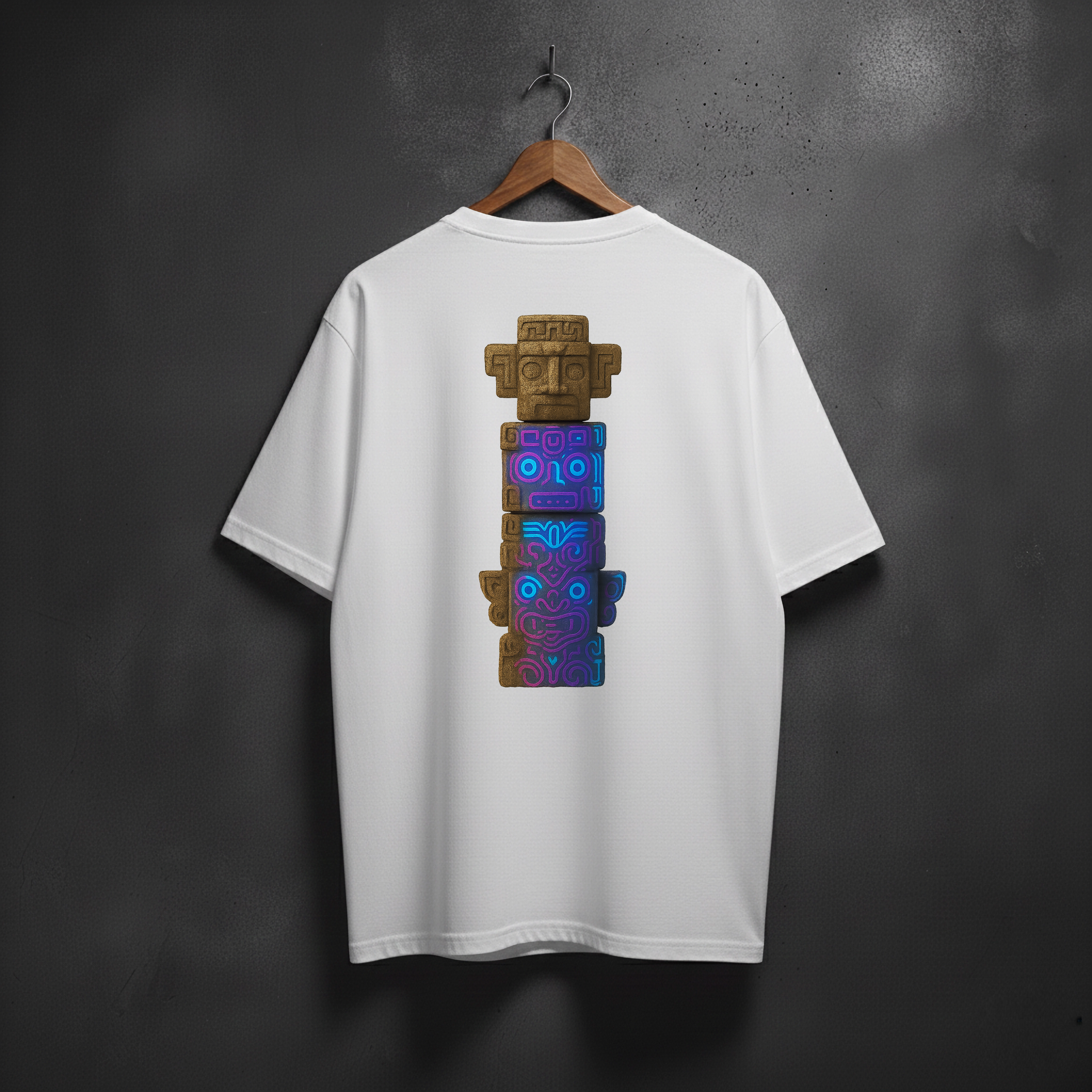 White t-shirt with a colorful totem graphic design on the back
