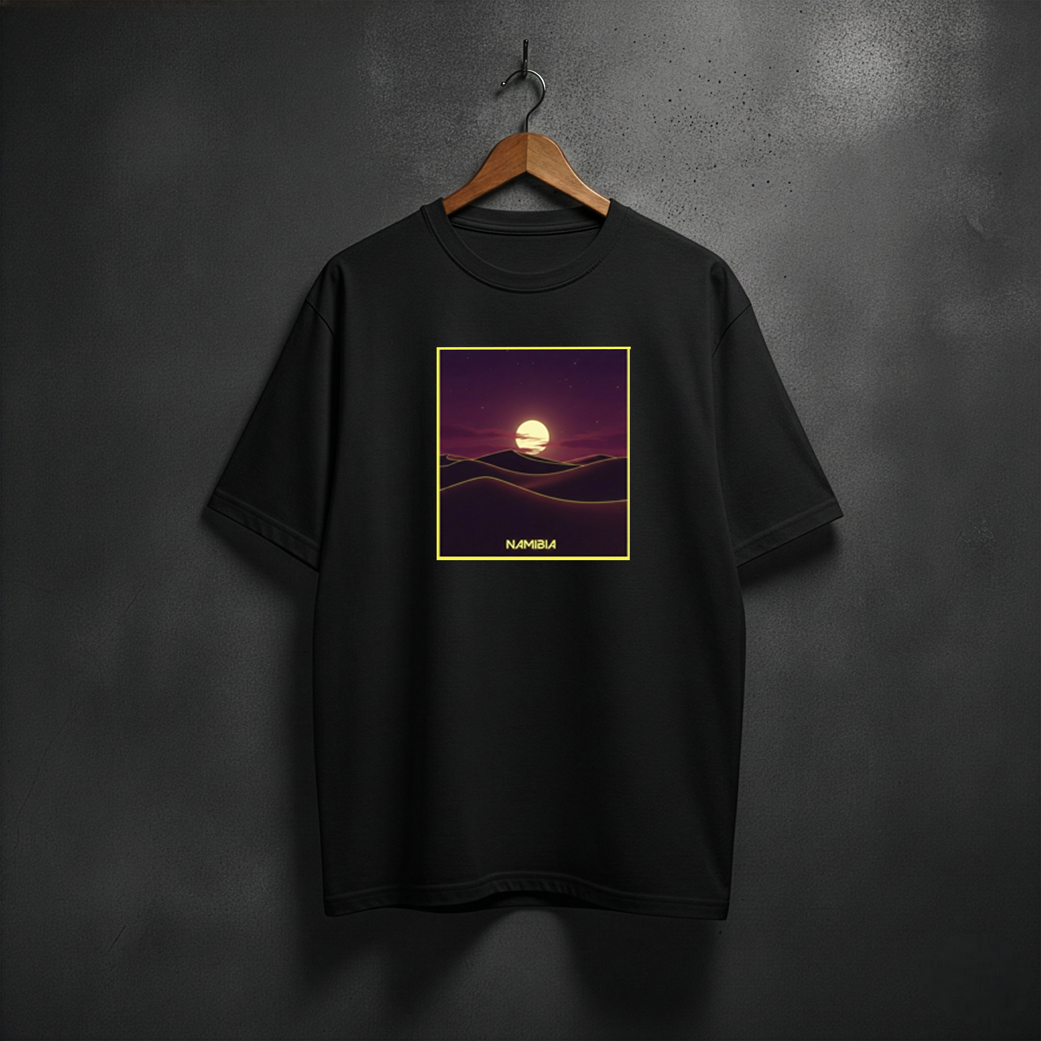 Black t-shirt with a sunset design of Namibia desert on the front