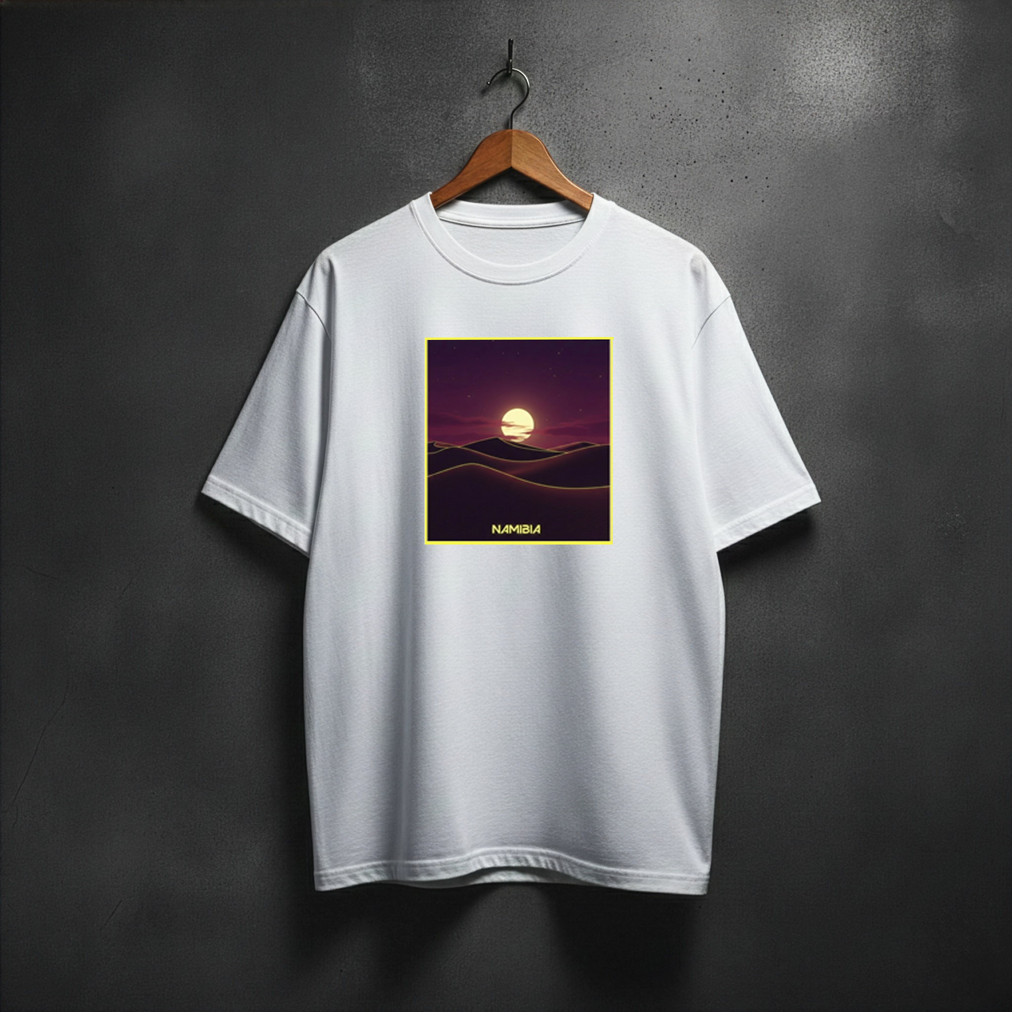 White t-shirt with a sunset design of Namibia desert on the front