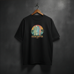 Black t-shirt with 'Ocean Drifter' graphic on the front chest