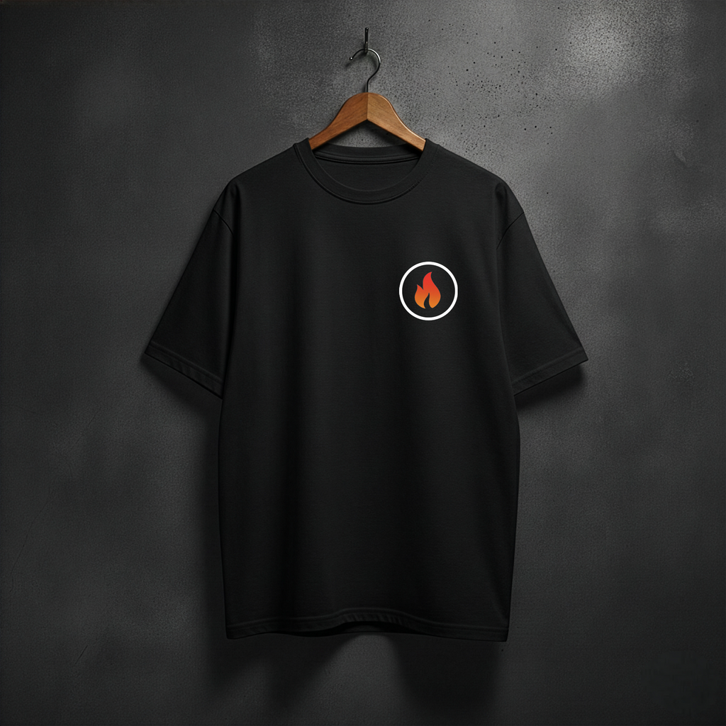 Black t-shirt with a circular logo featuring a flame on the front left chest