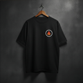 Black t-shirt with a circular logo featuring a flame on the front left chest