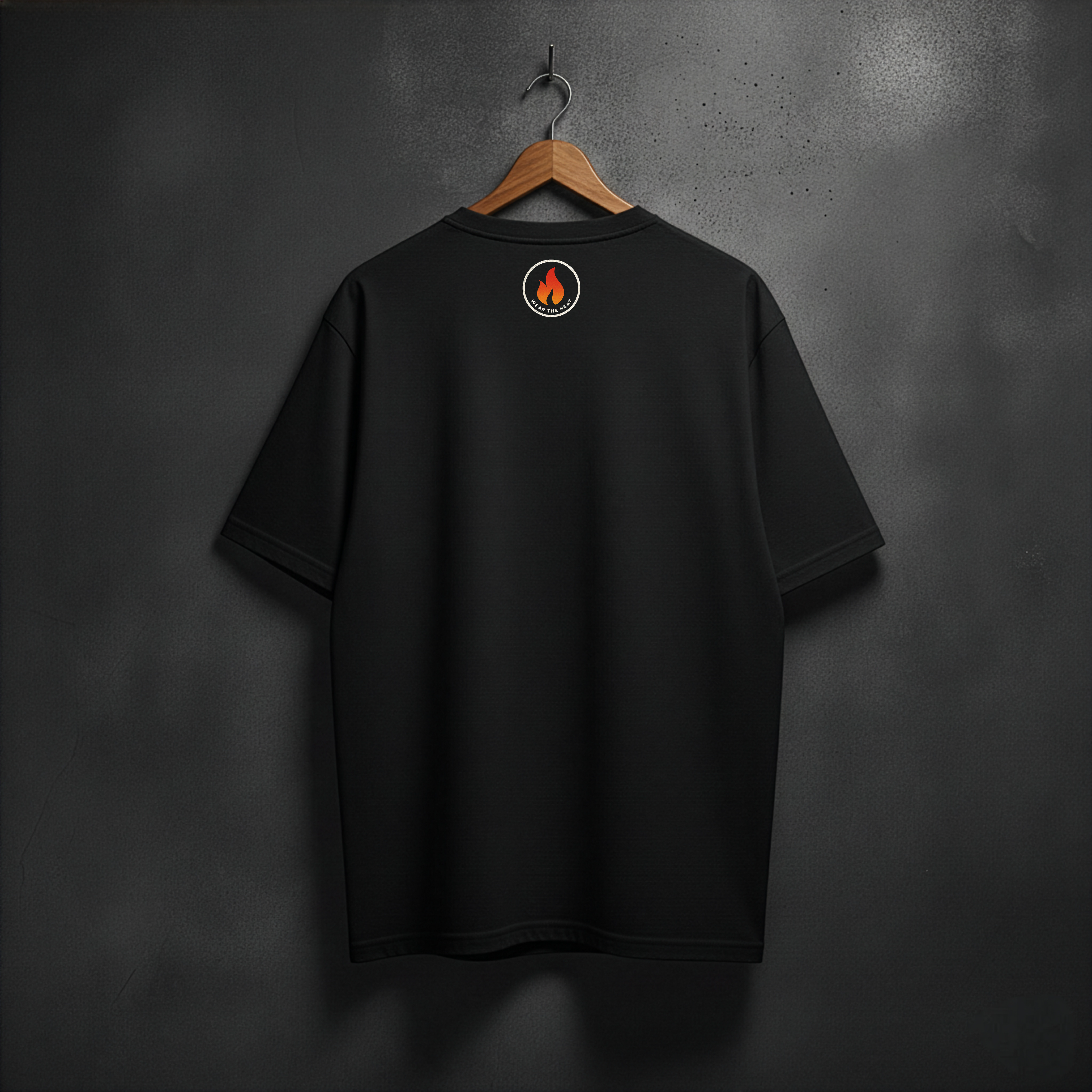 Black t-shirt with a small Fire logo at the back