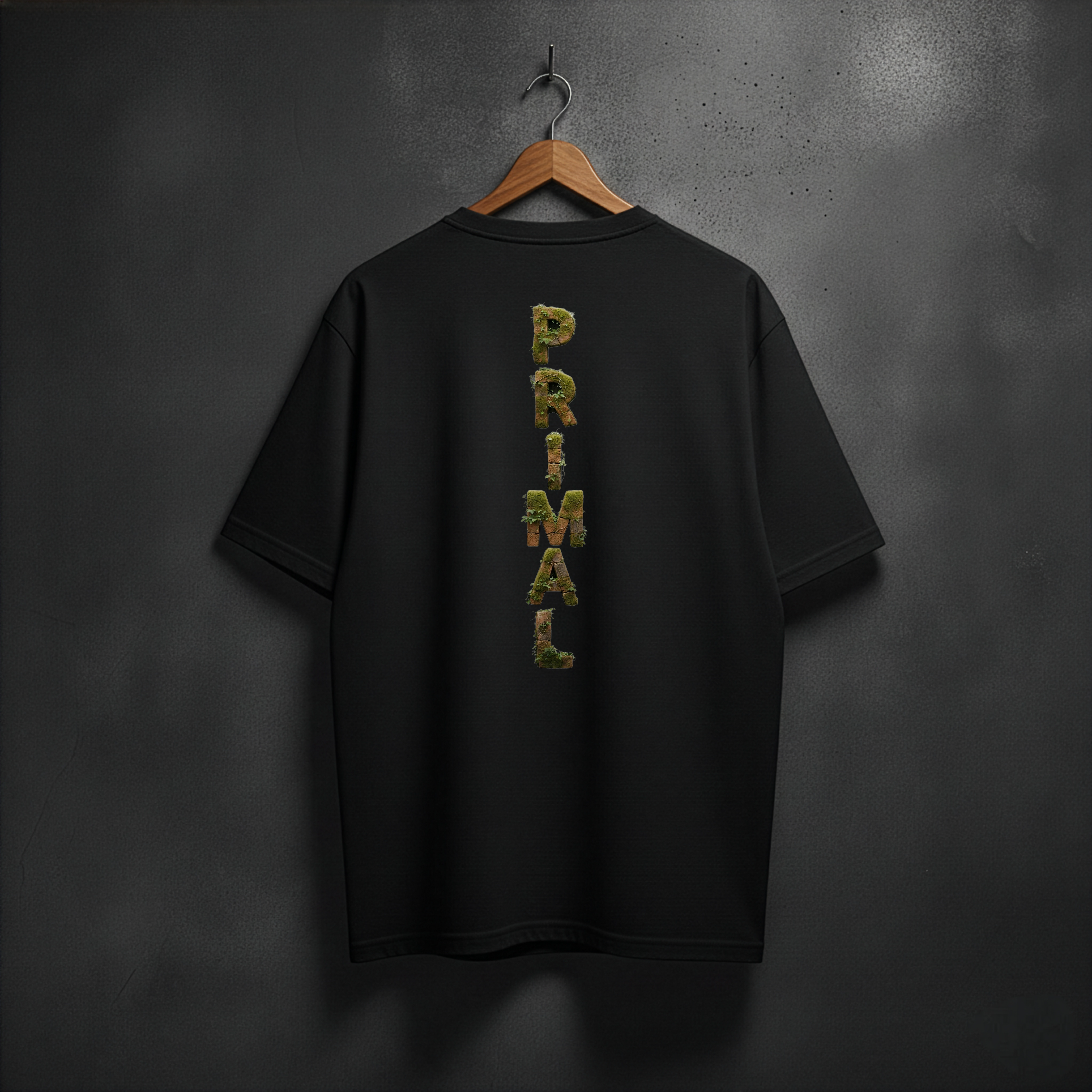 Black t-shirt with mossy 'PRIMAL' printed on the back