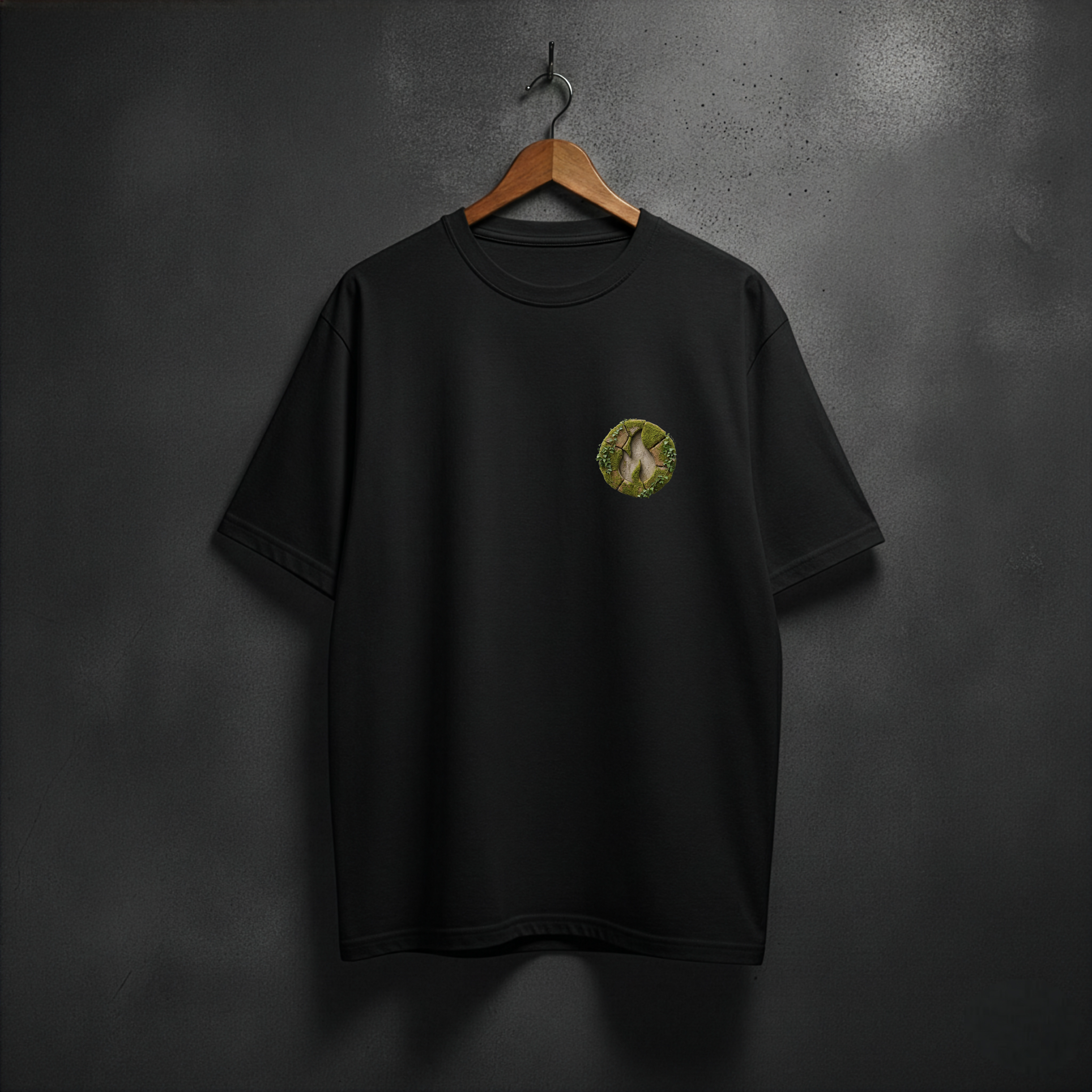 Black t-shirt with a mossy fire logo on the front chest