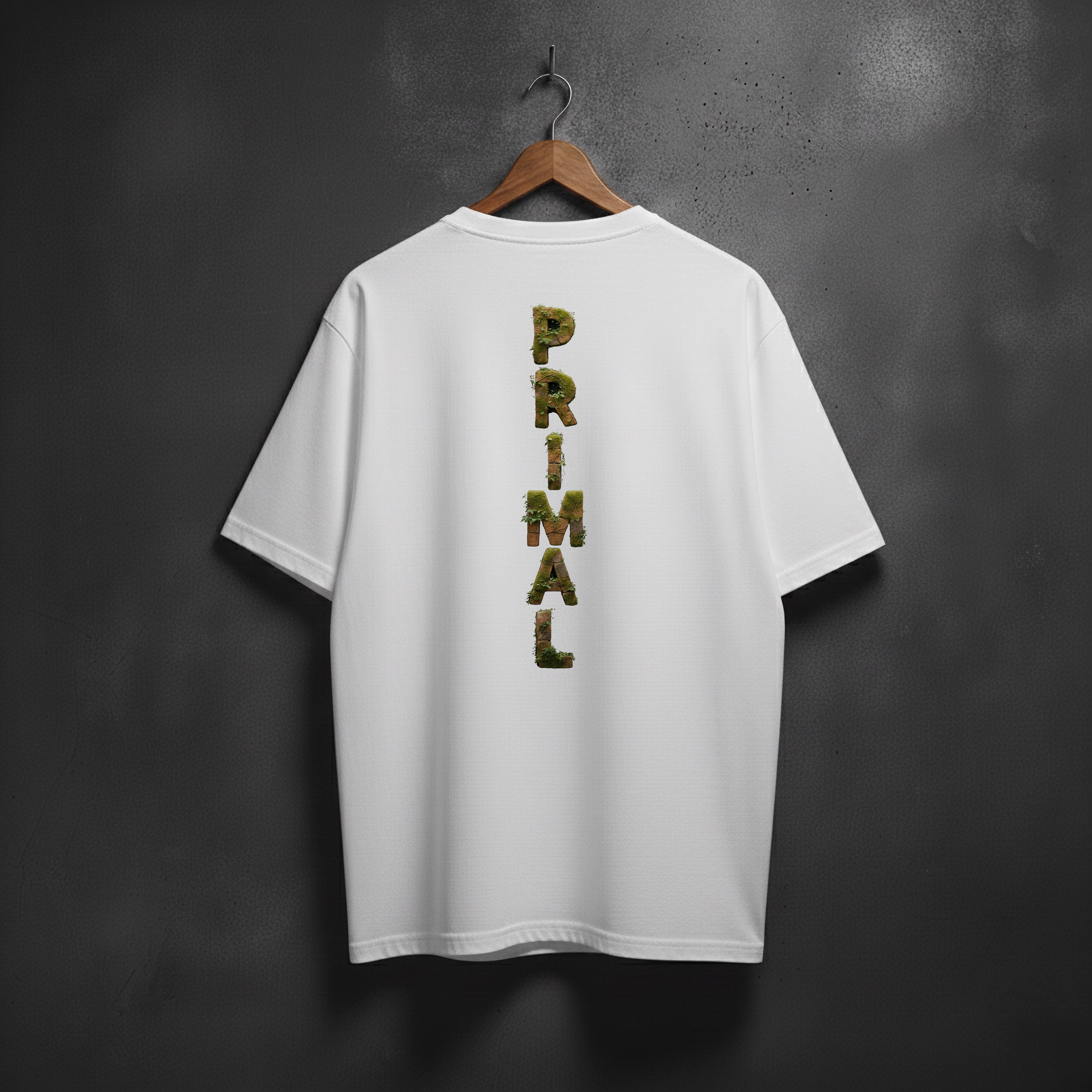 White t-shirt with mossy 'PRIMAL' text on the back