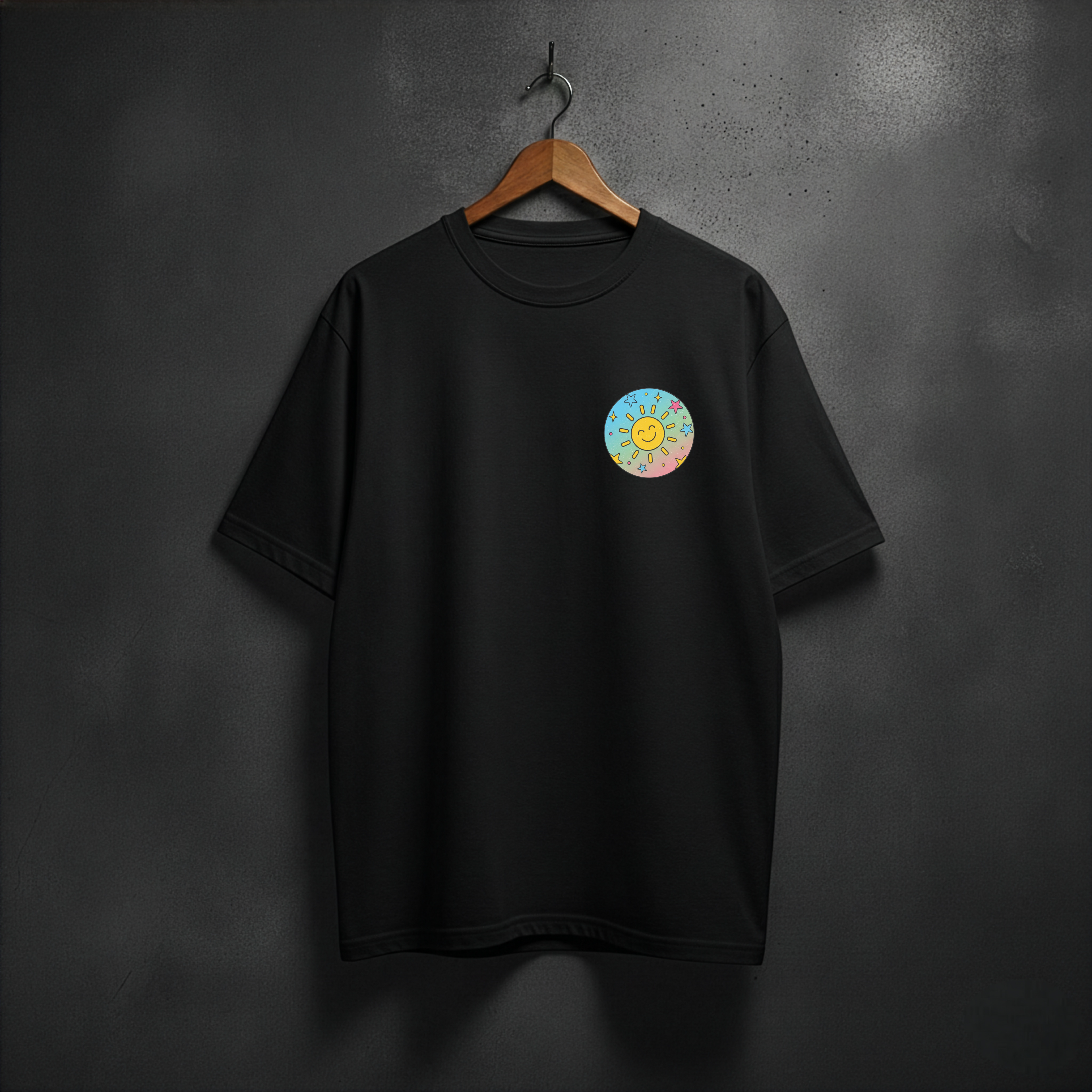 Black t-shirt with a colorful sun graphic on the front left chest