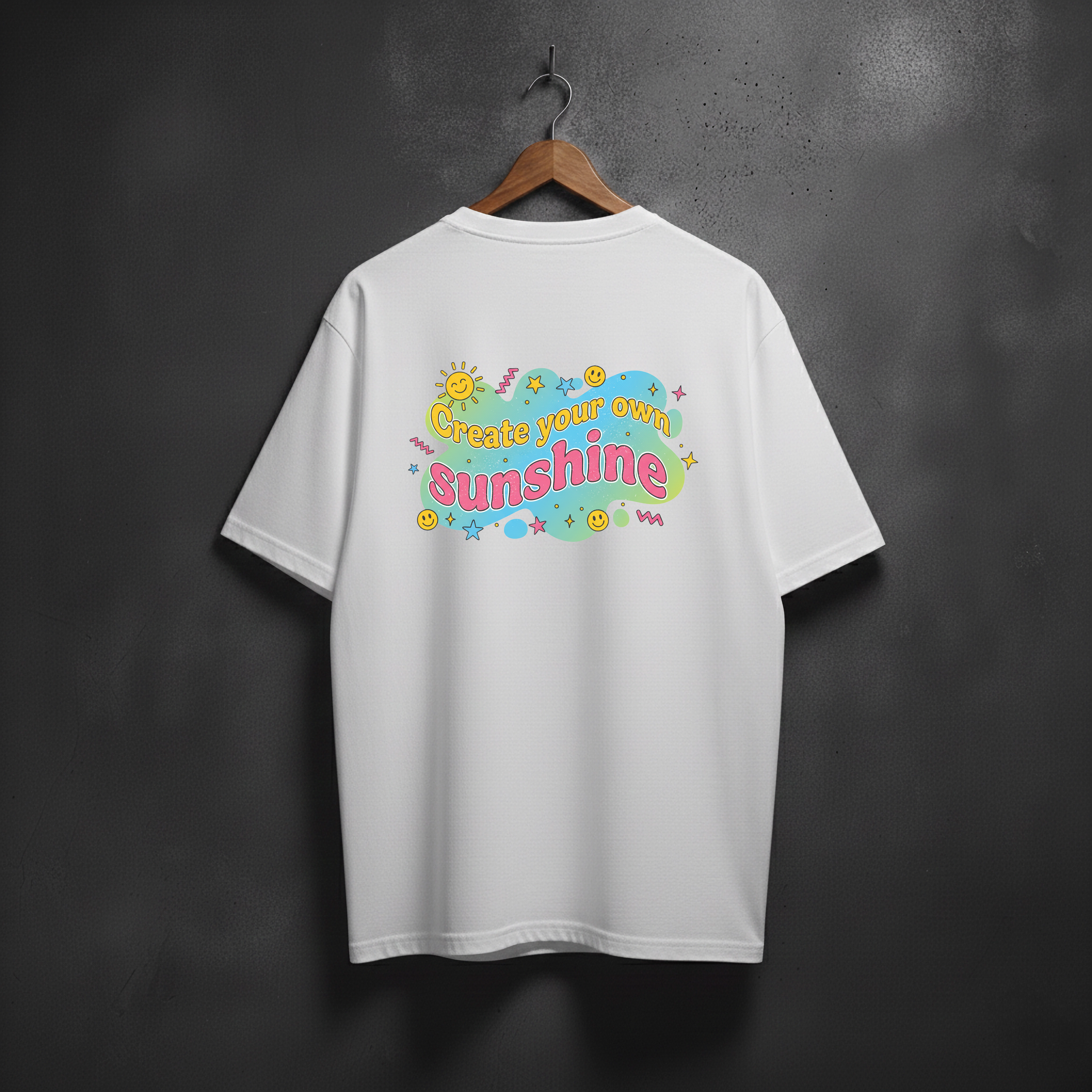 White T-shirt with colorful CREATE YOUR OWN SUNSHINE text design on the back