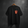 Black t-shirt with a colorful pocket design front left chest
